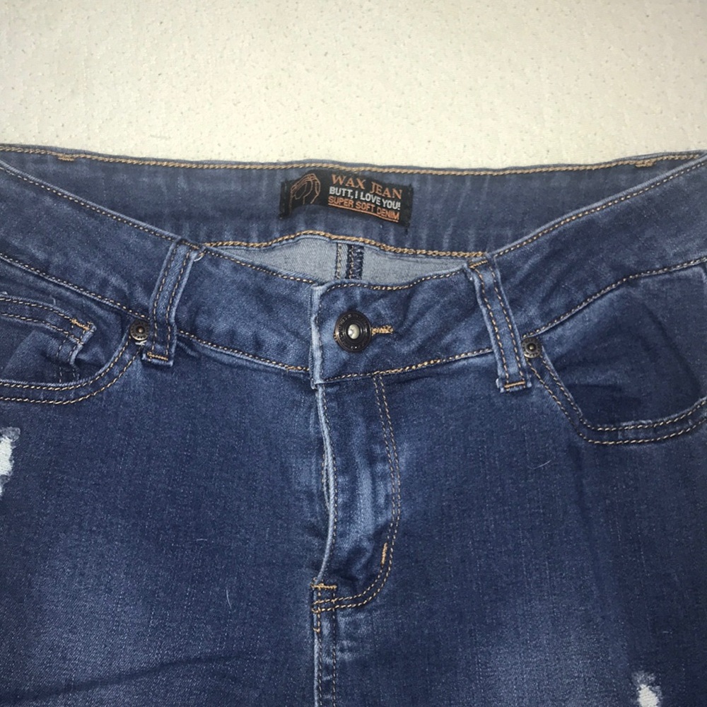 Ripped blue jeans